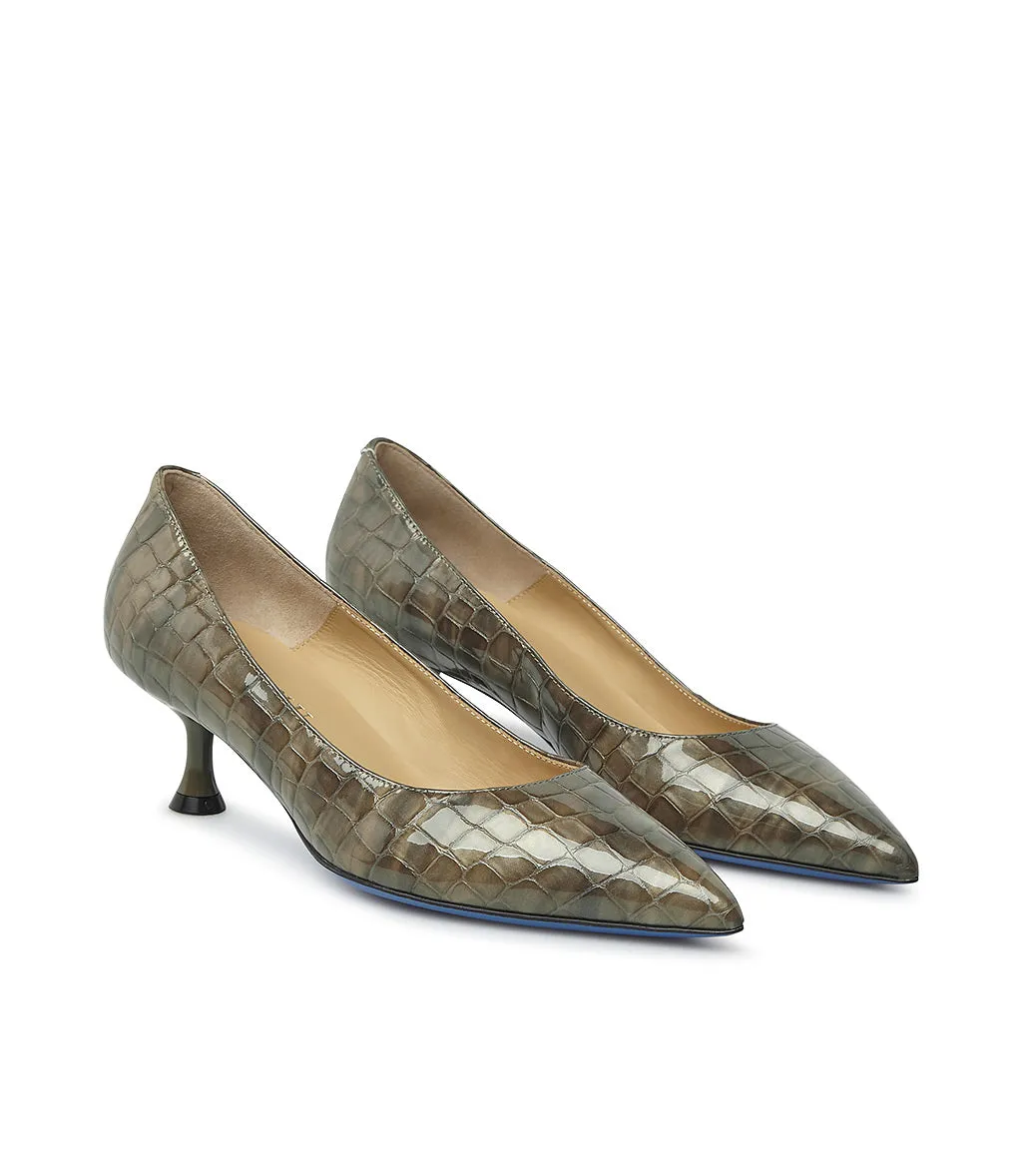 Mud embossed patent leather pumps