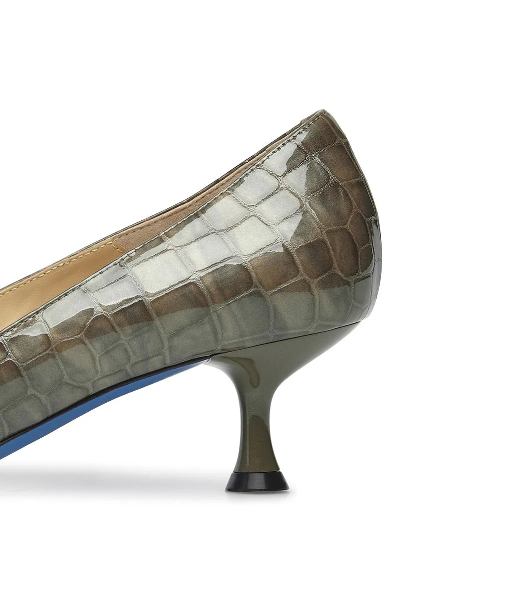 Mud embossed patent leather pumps